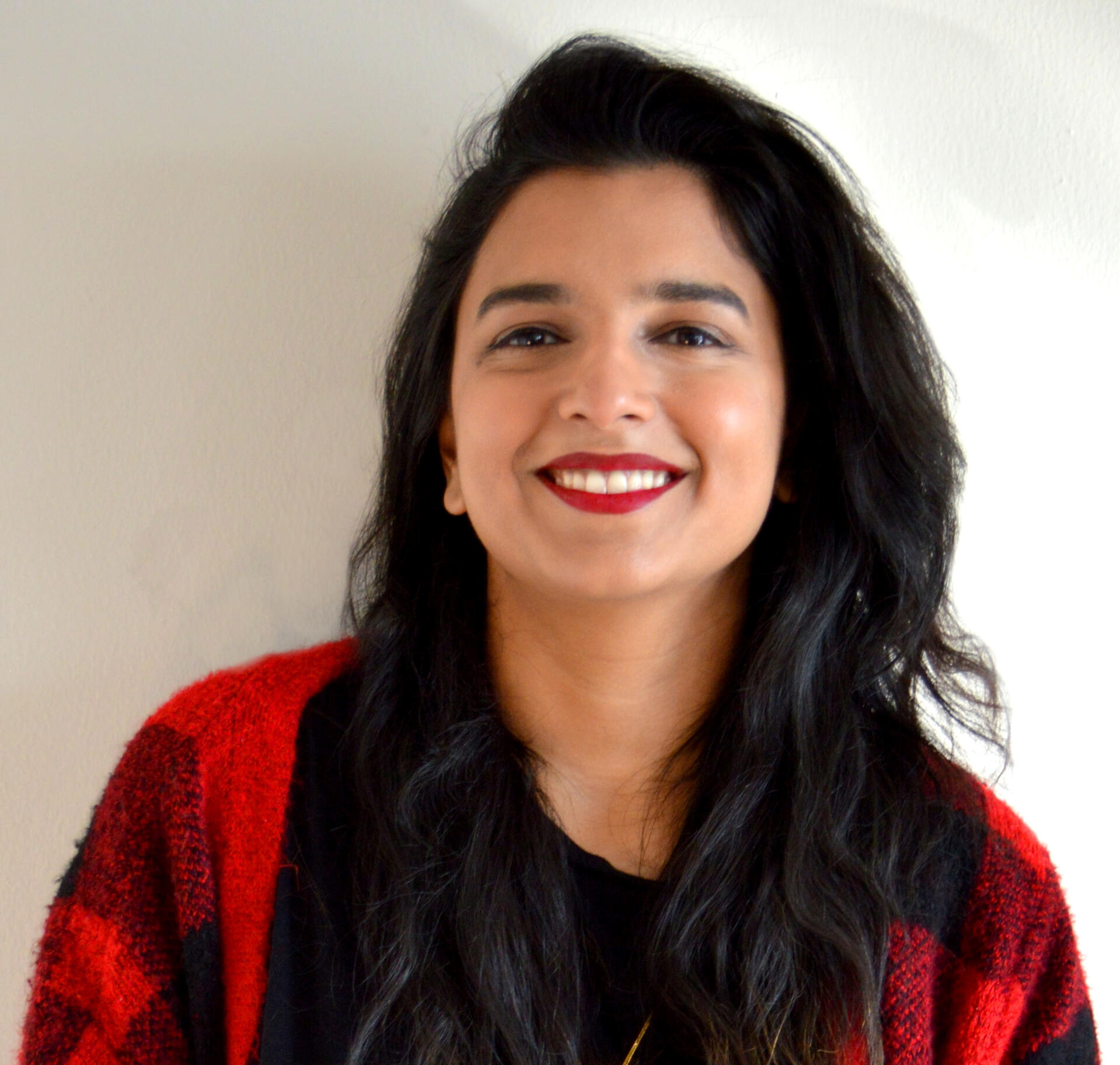 header image woman smiling at camera
